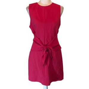 The Impeccable Pig pink sleeveless knotted mini dress